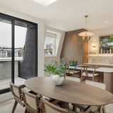 Strata Large Oval Walnut Dining Table by Eccotrading Design London