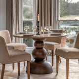 Sculpture Dark Mango Wood Round Dining Table Travertine Top - Maison Rêves UK