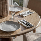 Sculpture Dark Mango Wood Round Dining Table Travertine Top - Maison Rêves UK