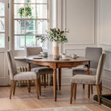 Solanis Extendable Mindi Wood Round Dining Table - Maison Rêves UK