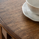 Solanis Extendable Mindi Wood Round Dining Table - Maison Rêves UK
