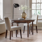 Verdanta Extendable Round Dark Mindi Wood Dining Table - Maison Rêves UK
