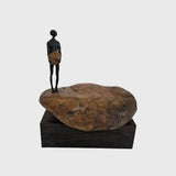 Bronze Figure On Rock Low