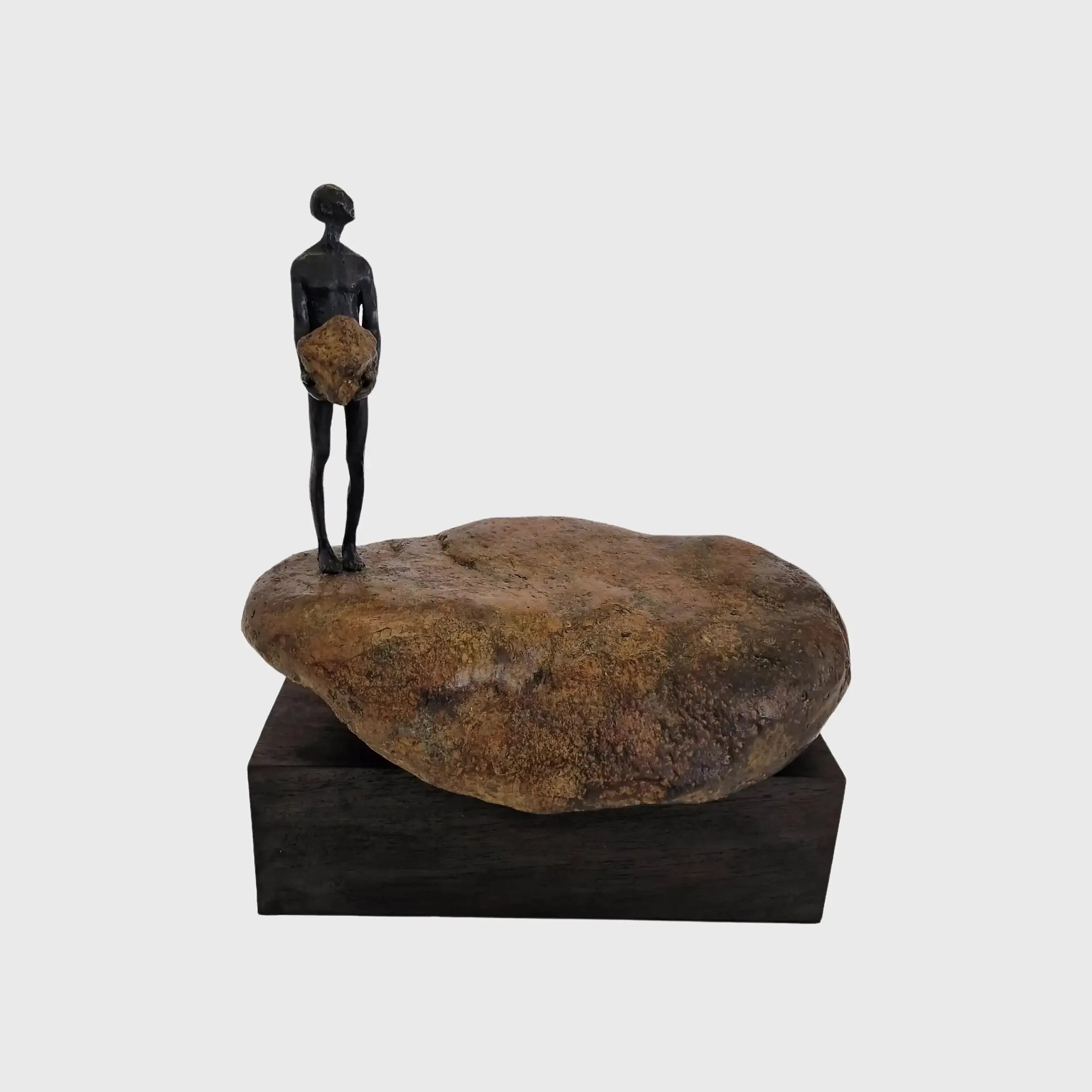 Bronze Figure On Rock Low