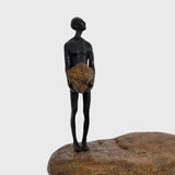 Bronze Figure On Rock Low