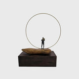 Bronze Figure On Rock With Ring