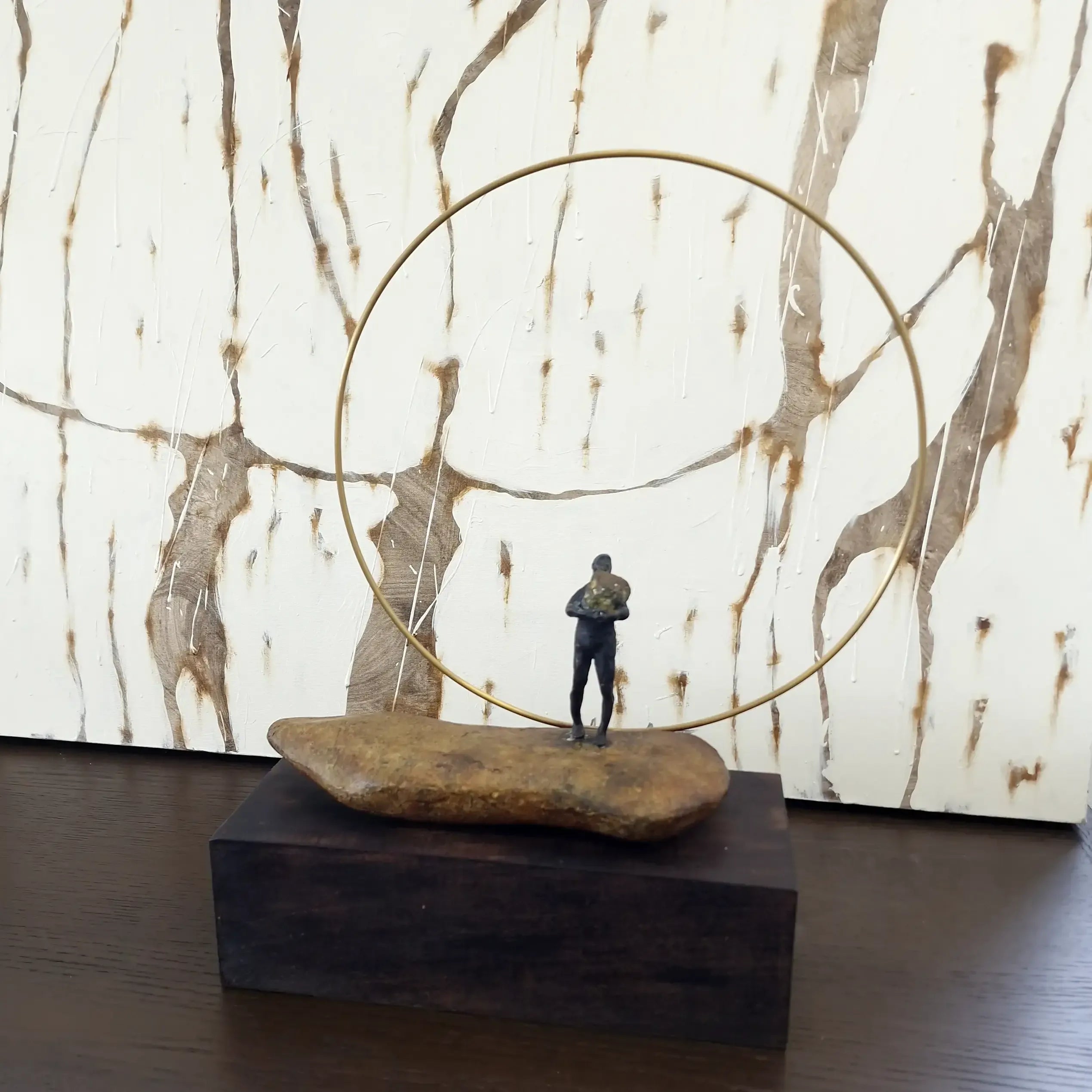 Bronze Figure On Rock With Ring
