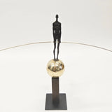 Bronze Figure On Sphere With Stick