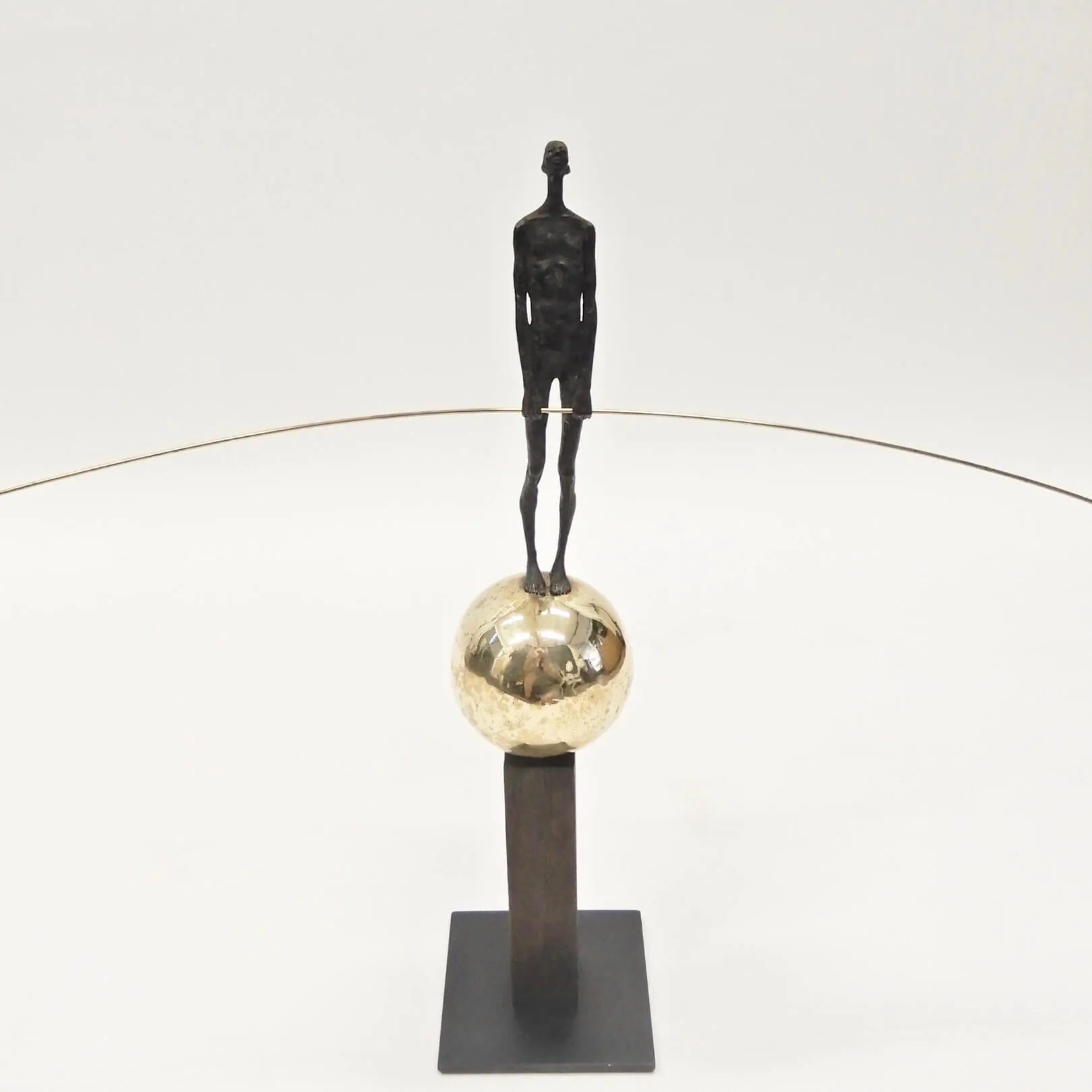 Bronze Figure On Sphere With Stick