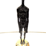 Bronze Figure On Sphere With Stick