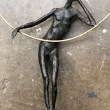 Bronze Figure With Gold Ring