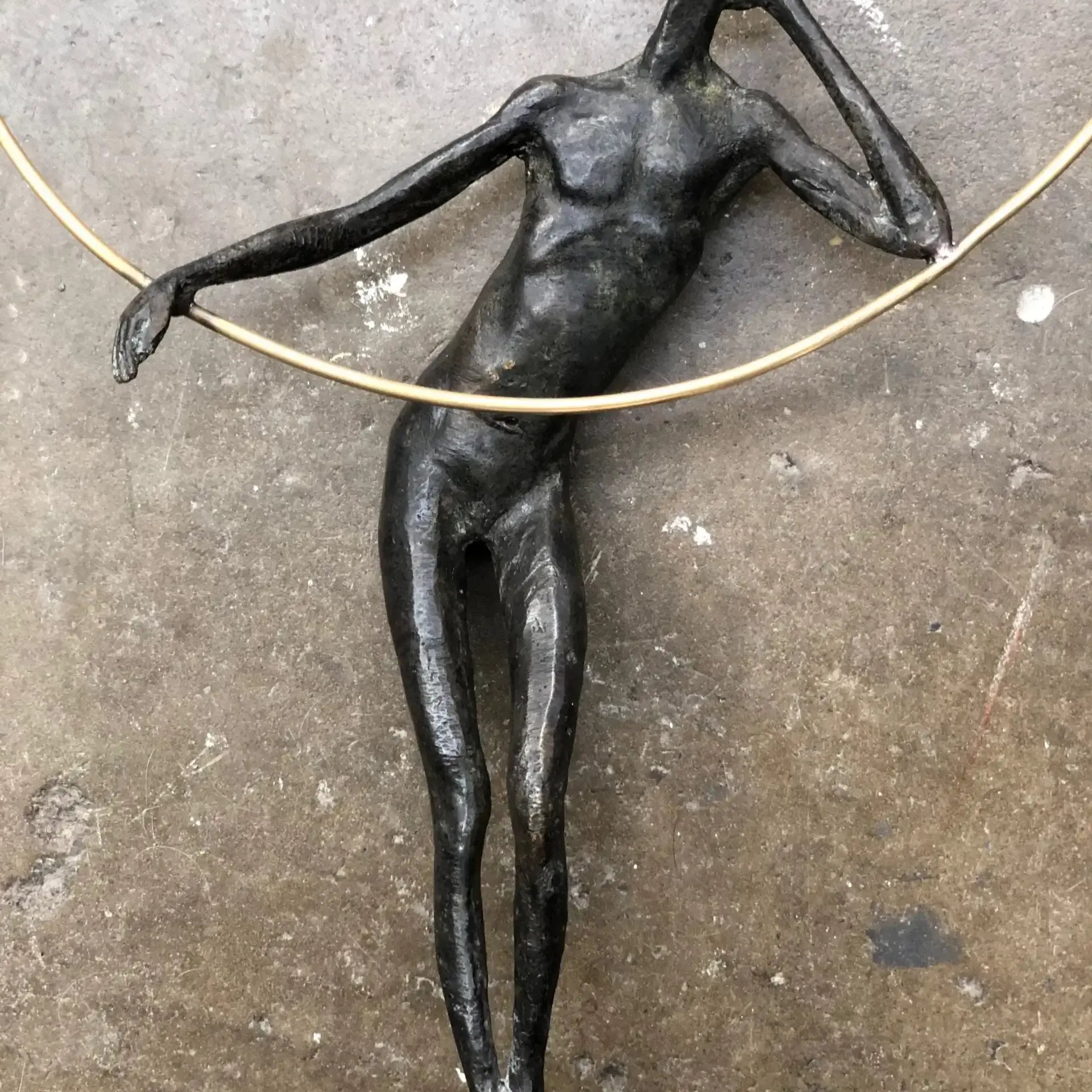 Bronze Figure With Gold Ring