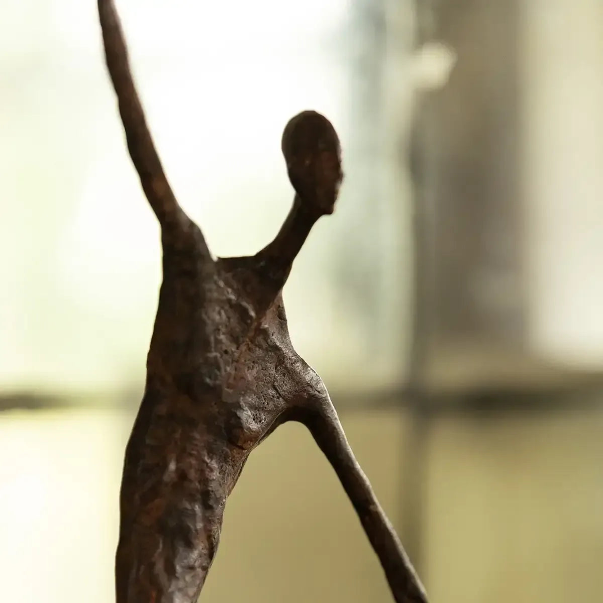 Bronze Figure with Hoop