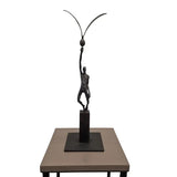 Bronze Man With Bird