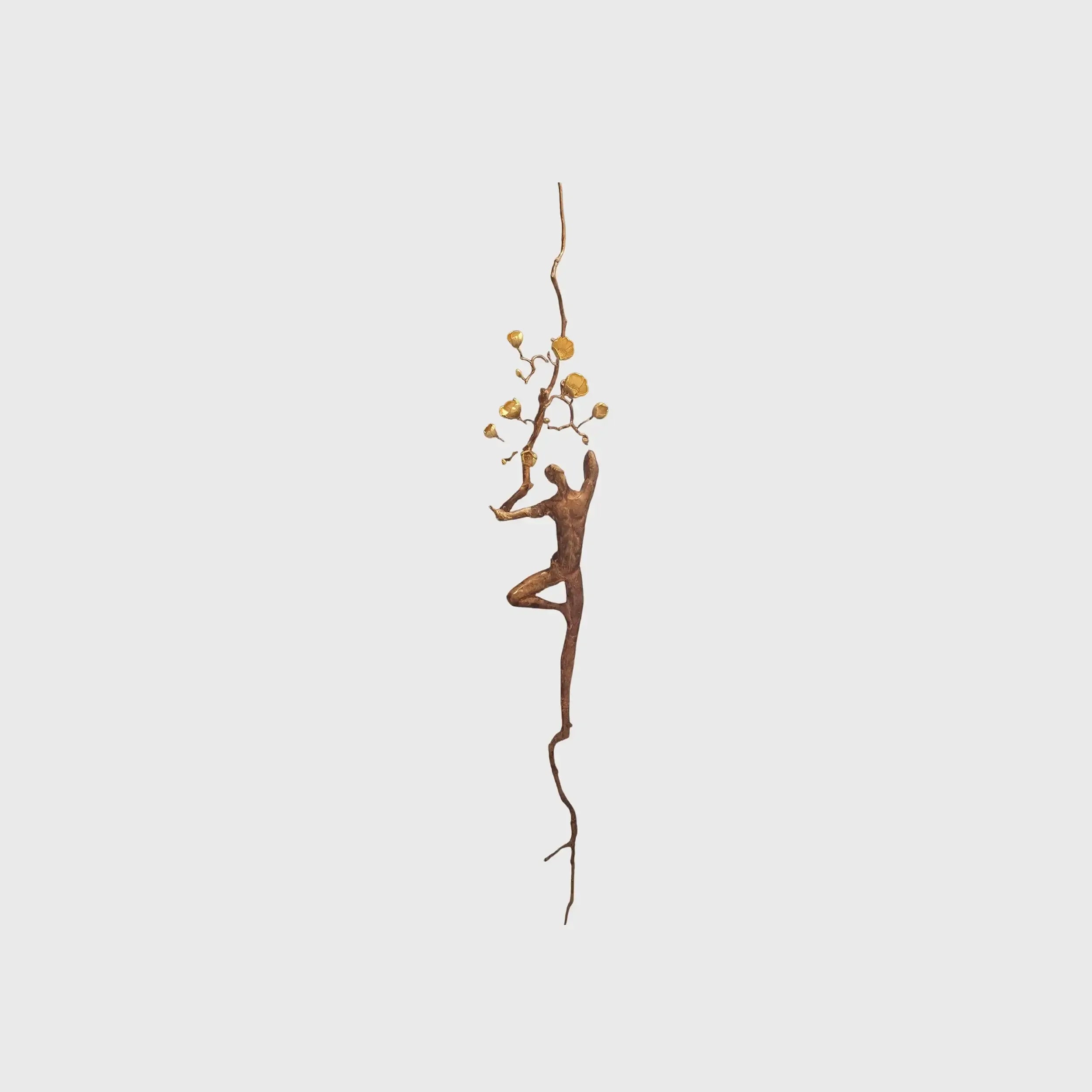 Bronze Wall Figure With Blossom