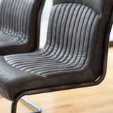 Capriccio Leather Dining Chair Antique Ebony with Black Legs - Maison Rêves UK