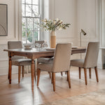 Solanis Extendable Mindi Wood Dining Table - Maison Rêves UK